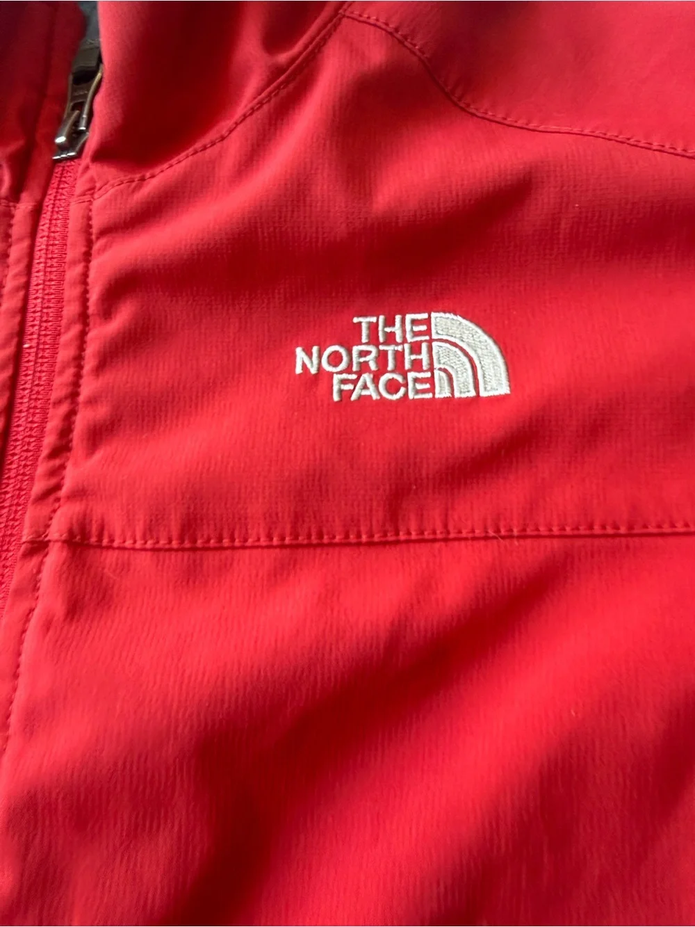 The North Face Kids Red and Black Softshell Rain Jacket